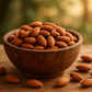 Almonds in a bowl and spread outside the bowl with natural background behind